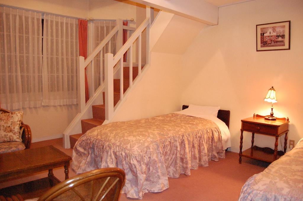 Petit Hotel And Restaurant Air Mail Hakuba Habitación foto